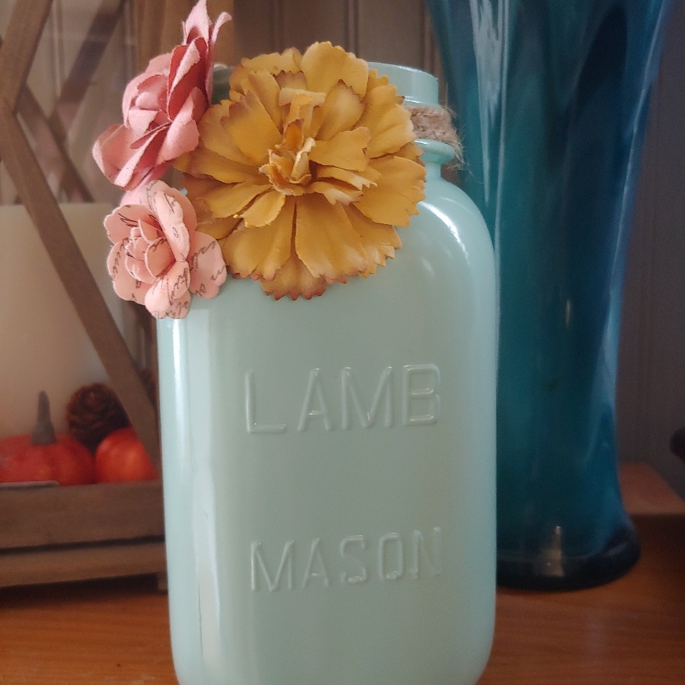 Mason jars with decorative flowers